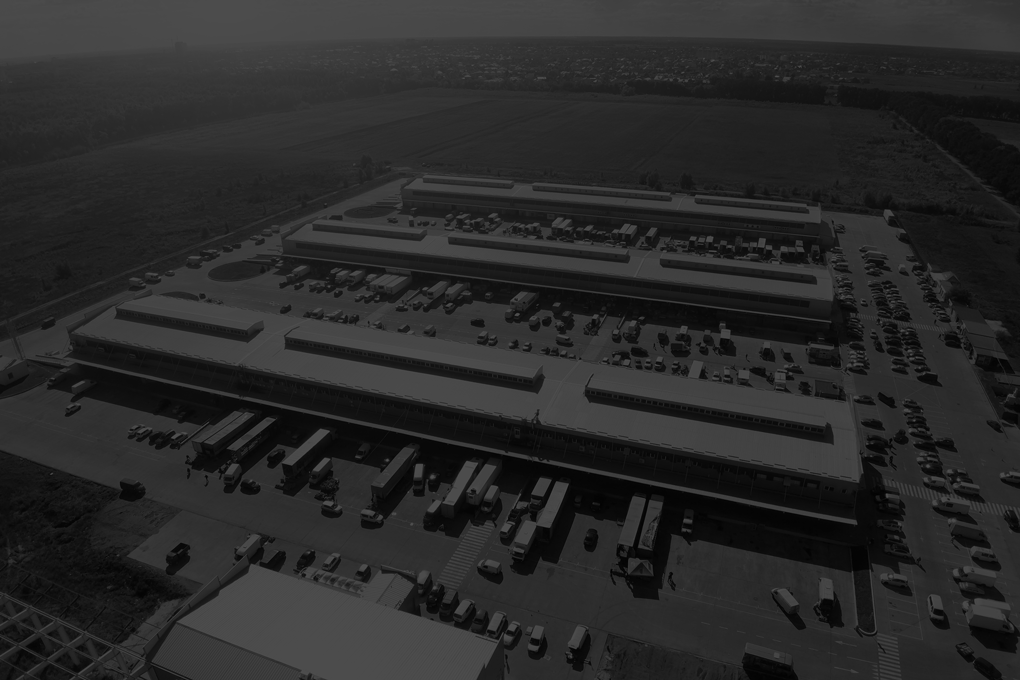 Aerial-drone-view-of-group-of-large-modern-industrial-warehouse-or-factory