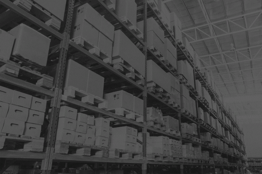 Rows-of-shelves-with-boxes-in-factory-warehouse