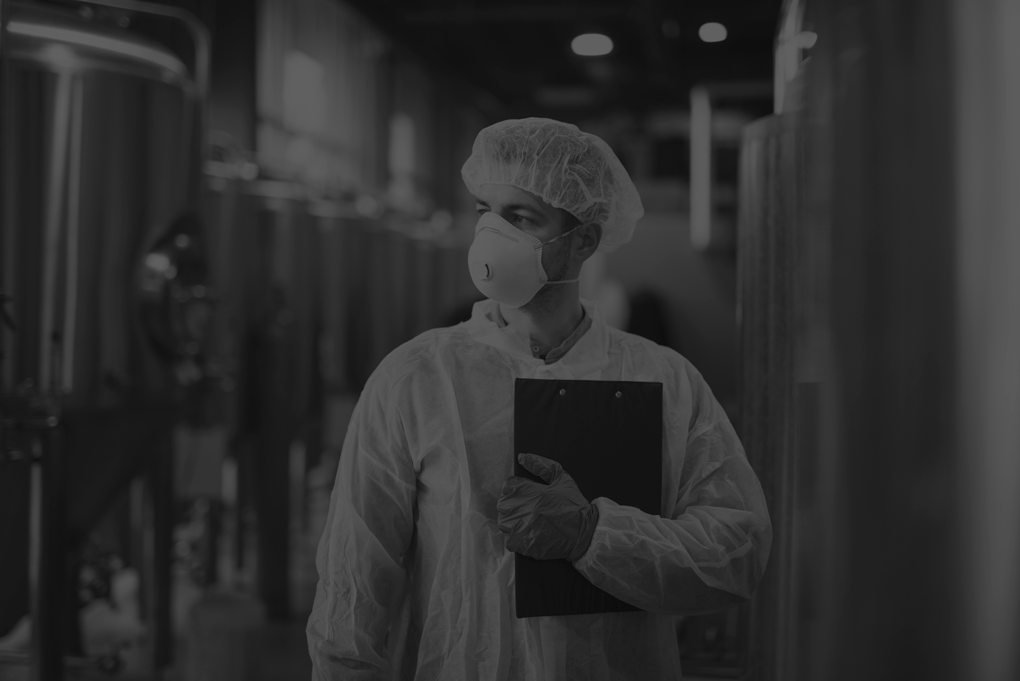 technologist-protective-white-suit-with-hairnet-mask-standing-food-factory