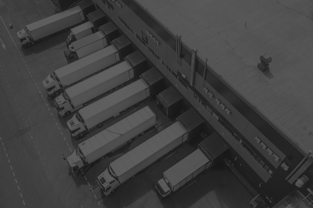 aerial-view-trucks-loading-distribution-hub