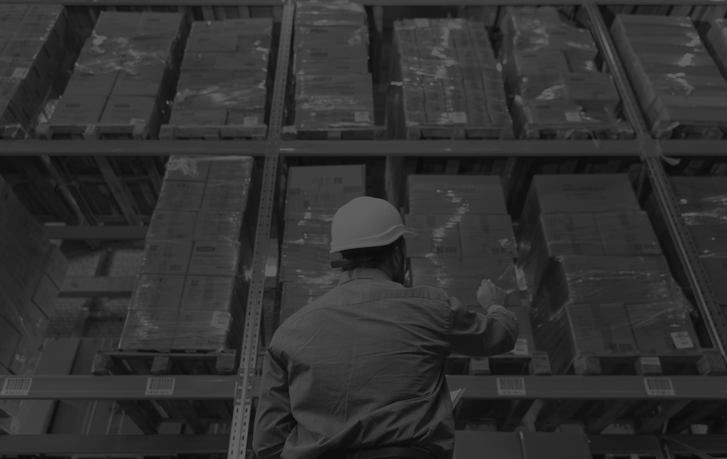 man-with-helmet-working-warehouse