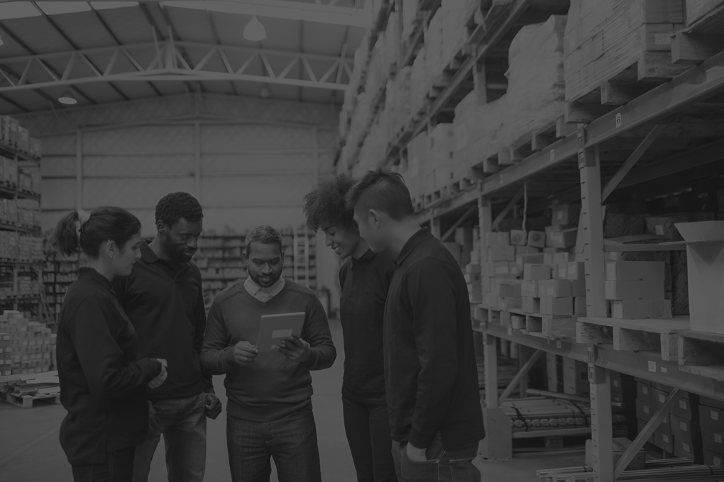 warehouse-manager-discussing-with-logistics-team