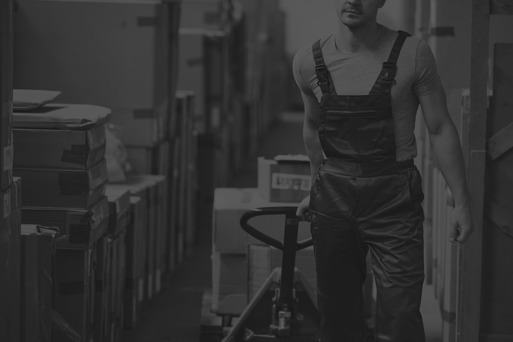 young-male-worker-uniform-is-warehouse-with-pallet-truck