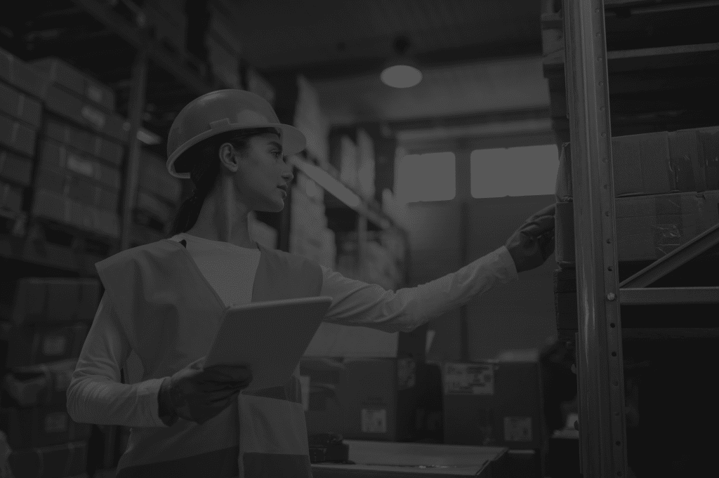 women safety equipment working with barcode scanner black and white